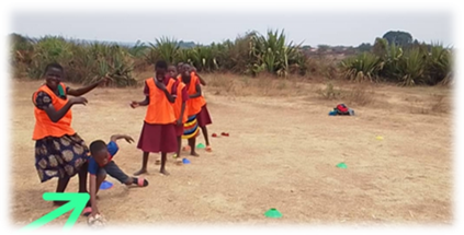 Proud reaching for a ball during chain gang at Khambadzo Primary School